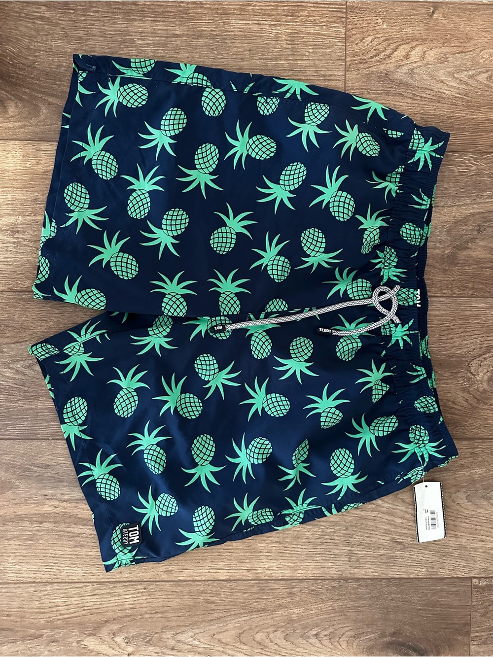 Tom & Teddy Navy Swim Shorts with Bright Green Pineapple Print